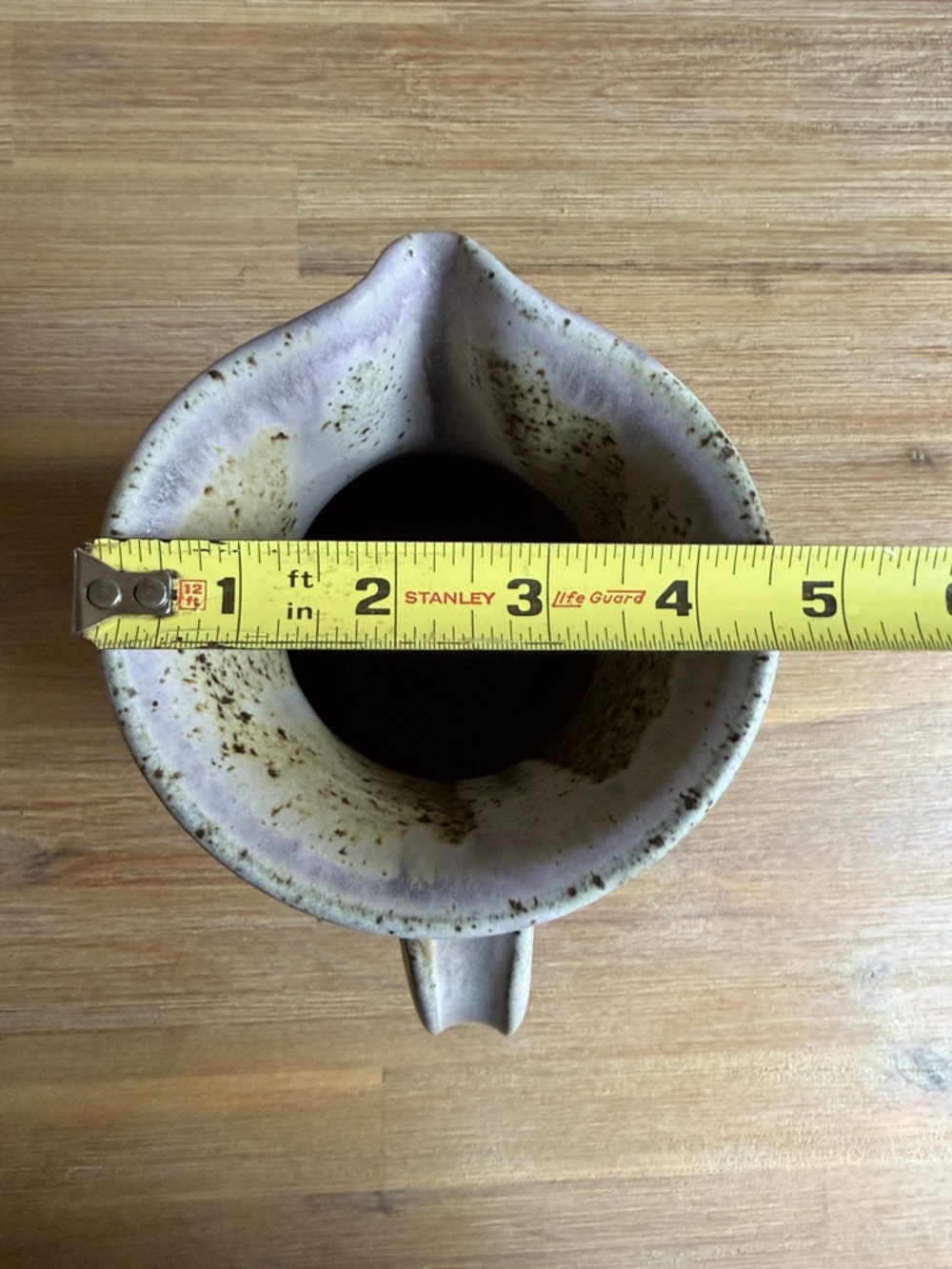 Handcrafted Speckled Ceramic Pitcher in Beige with Blue Stripe - Picture 12 of 13